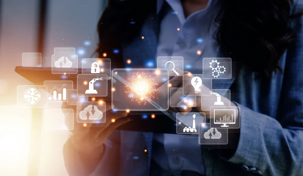 Businesswoman focused on a tablet displaying various icons, indicating tasks or applications in a modern office setting.