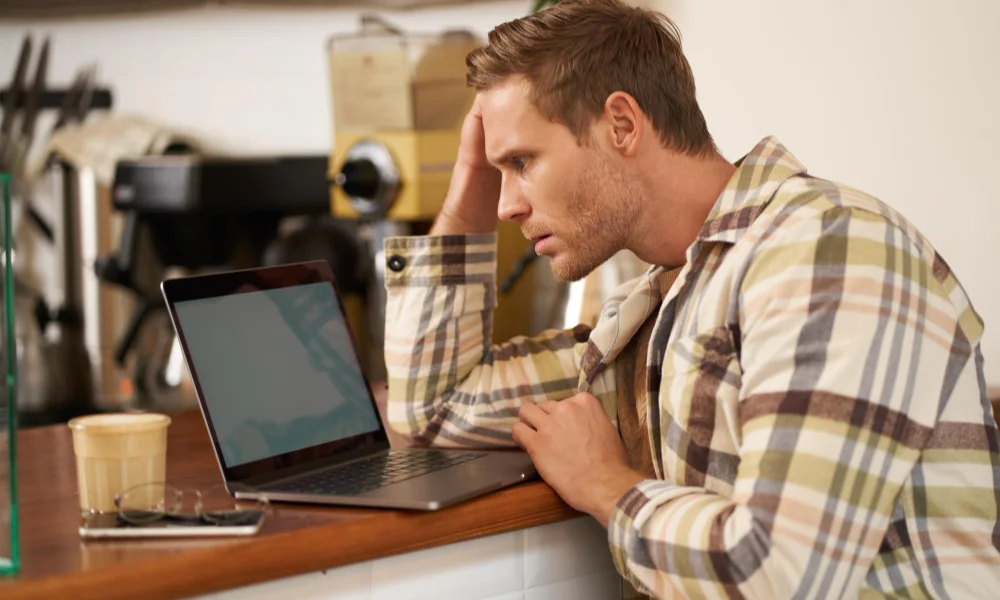 A man in a plaid shirt-why website slow